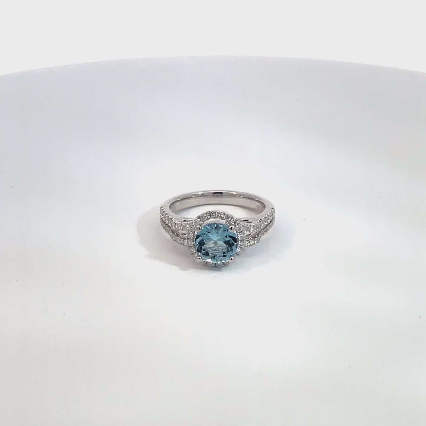 Round Aquamarine and Diamond Ring