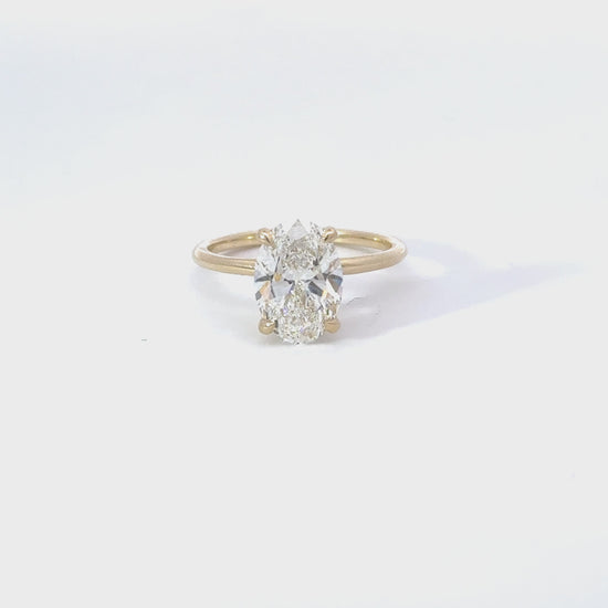 Load and play video in Gallery viewer, 2.00-2.99 Carat Oval Lab Grown Diamond Solitaire Engagement Ring with Hidden Halo
