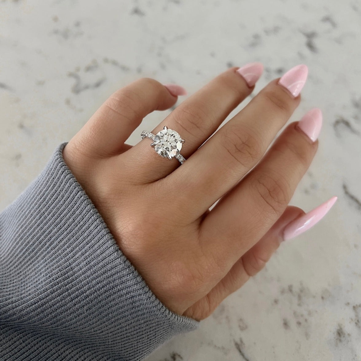 2 carat round diamond ring on hand Clearance