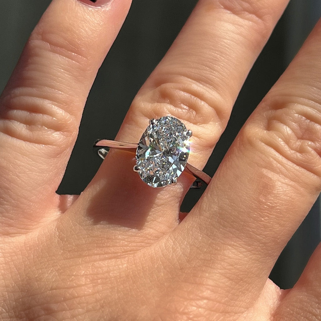 Oval Diamond Solitaire Engagement Ring Paired with Unique Diamond Wedding  Band | Dream engagement rings, Wedding ring bands, Future engagement rings