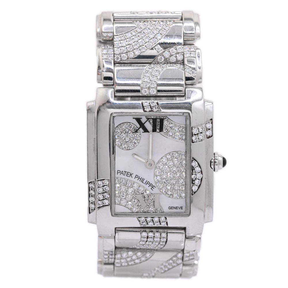 Patek Philippe Womens White Gold 25mm White MOP Roman Dial Watch Reference #: 4910/49G-001 - Happy Jewelers Fine Jewelry Lifetime Warranty